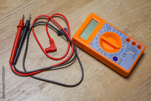 Obraz na plátně Digital multimeter with wires, tool for battery voltage checking