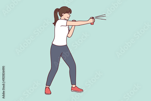Young woman using pepper spray or tear gas for self-defense. Protection against danger, personal safety concept, and female empowerment in threatening situations.