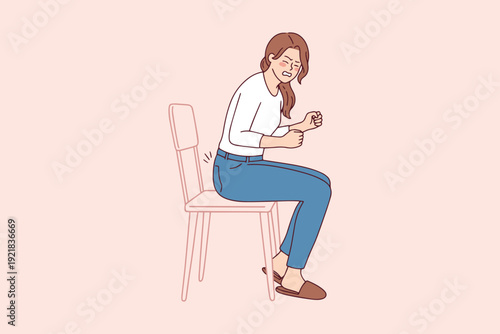 Woman experiencing pain while sitting on chair due to hemorrhoids. Concept of proctology medical discomfort, inflammation, and rectal health problems.