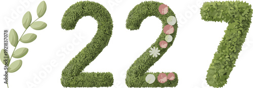 Green topiary numbers 227 decorated with delicate pink roses and white flowers alongside a sprig of green leaves