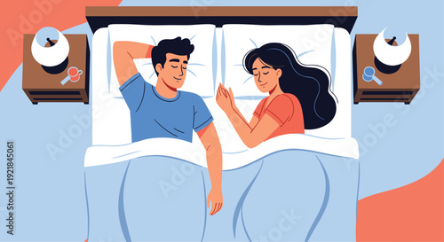 Young couple sleeping peacefully together in a comfortable bed seen from an overhead view, with nightstands and lamps on both sides.