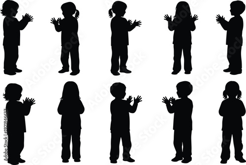 Set of silhouettes showing male construction workers and manual laborers stacking large bricks and building walls isolated on a plain white background