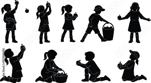 Set of silhouettes showing young children and toddlers picking apples and carrying fruit baskets in various harvest poses on white background