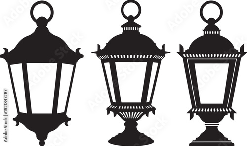 Set of three ornate black silhouette lanterns, styled as vintage street lamps or decorative garden lights.