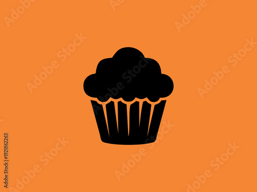 Cupcake muffin silhouette icon isolated on orange background
