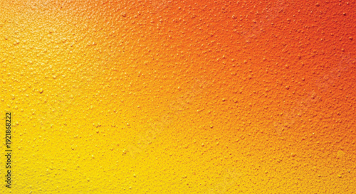 Textured surface with a gradient from vibrant yellow at the bottom to deep orange at the top, resembling a warm sunset. The surface has a rough, speckled appearance.