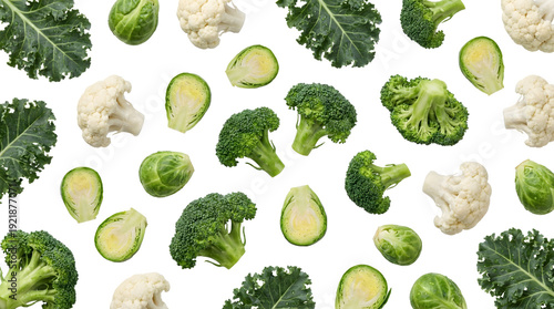 Fresh green and white cruciferous vegetables pattern on a clean white background, featuring broccoli florets, cauliflower heads, kale leaves, and halved Brussels sprouts arranged in a scattered
