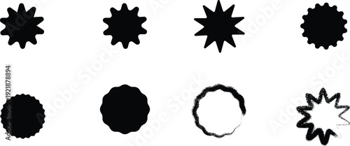 Collection of black inkblot shapes on white background