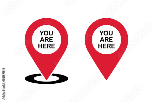Red map pin icons with you are here text
