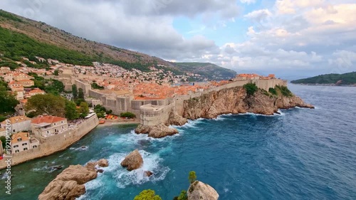 The historic Fort Lovrijenac on a rocky cliff and the blue Adriatic Sea in Dubrovnik, Croatia, on a sunny day