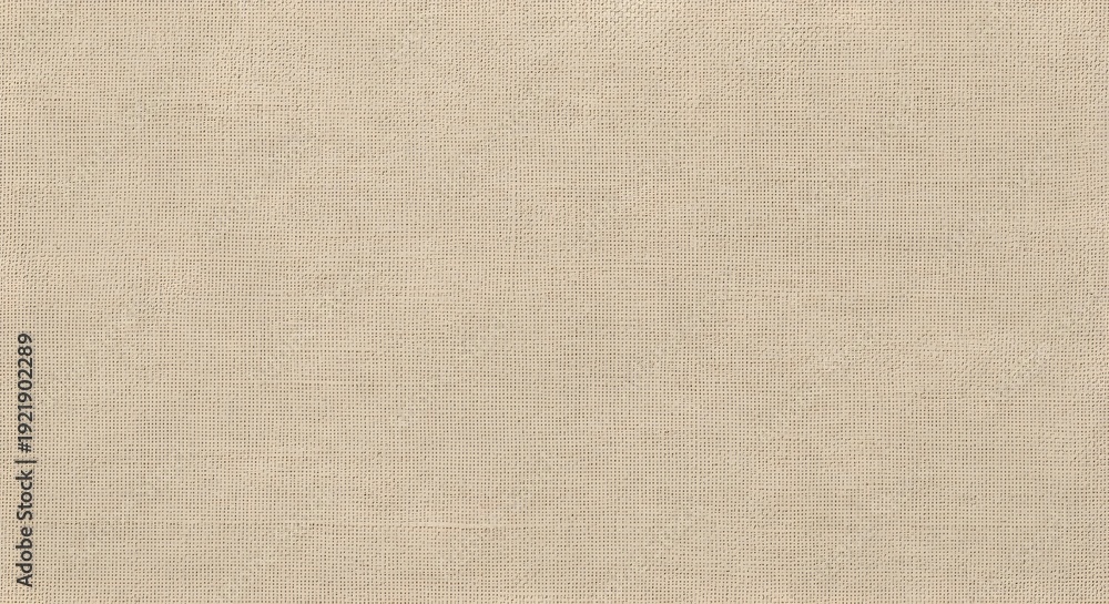 Fototapeta premium Beige textured background with subtle fabric weave pattern