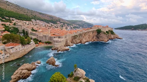 The historic Fort Lovrijenac on a rocky cliff and the blue Adriatic Sea in Dubrovnik, Croatia, on a sunny day