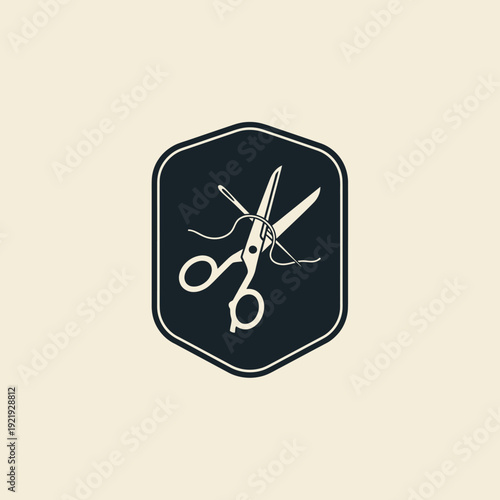 A sewing icon features scissors, a needle, and thread within a shield-shaped frame