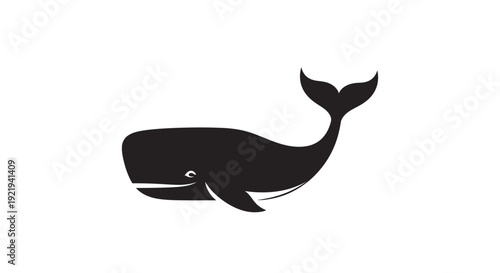 Black silhouette of a whale swimming.