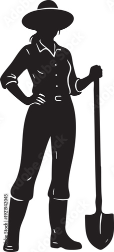 A woman female gardener or farmer holding a gardening tool 