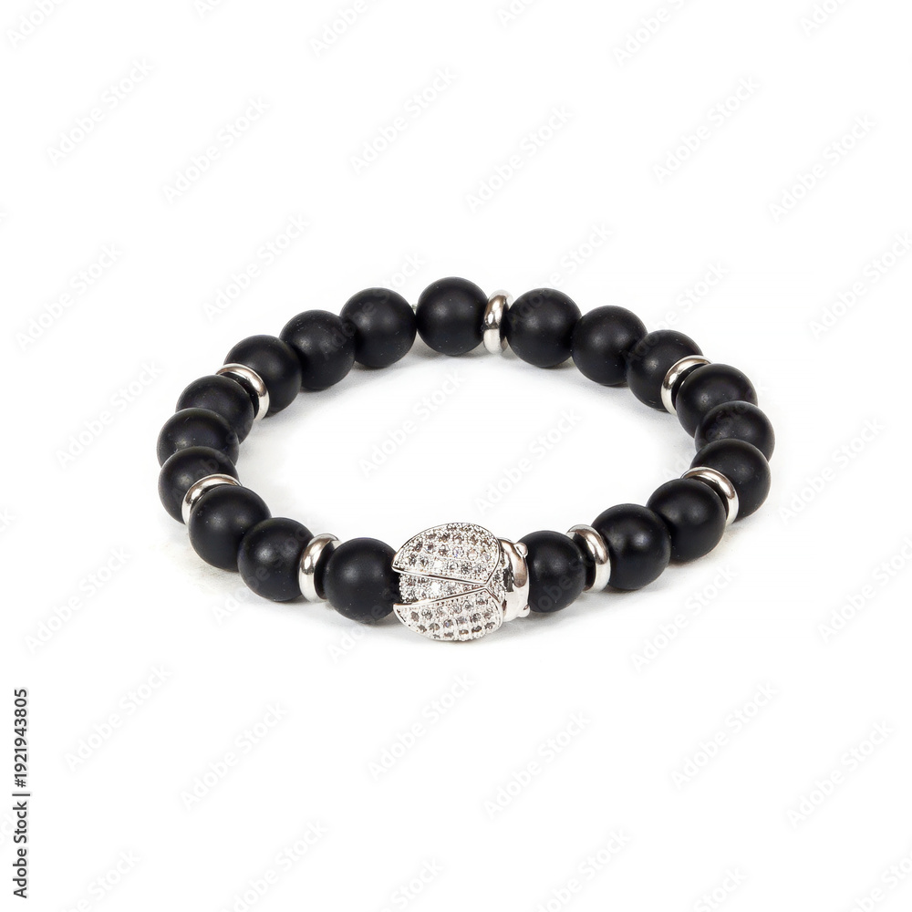 Obraz premium High-quality studio shot of a bold black stone wrist accessory for men. Representing strength, modern style, and professional craftsmanship for masculine fashion and retail.