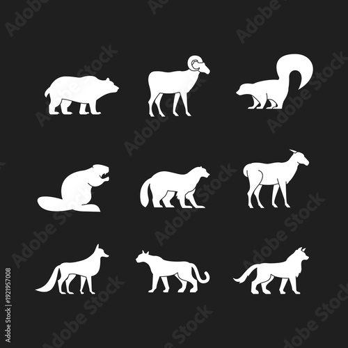 Wild Animal Silhouettes Vector Icons Set. Collection of Mammals Isolated on Black Background for Nature and Wildlife Designs.
