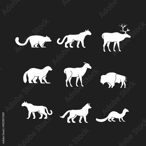 Set of Wild Animal Silhouettes Vector Icons on Dark Background