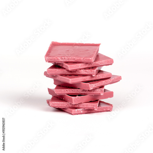 Stack of pink chocolate bars isolated on white background