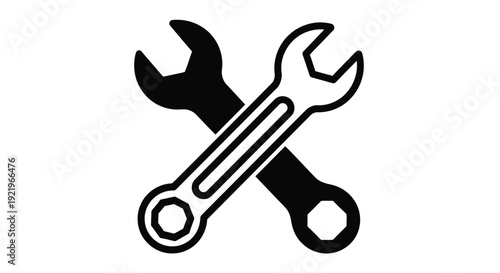 Two crossed wrenches depicted in a stark black silhouette
