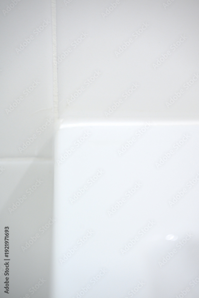 custom made wallpaper toronto digitalClose-up of white bathtub corner against tiled wall in bathroom