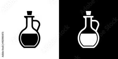 Black and white bottle with liquid and handle