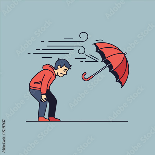 Man struggles with wind and umbrella in a storm.