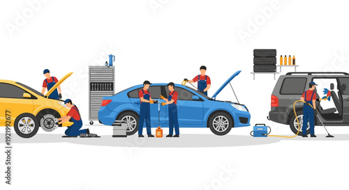 Mechanics Working on Cars in Garage.