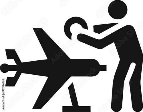 Aviation professional inspects an airplane mounted on a stand with a circular component