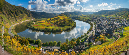 The Moselle loop near a beautiful Bremm village with Stuben Monastery ruins and surrounding vineyards in autumn season. Germany