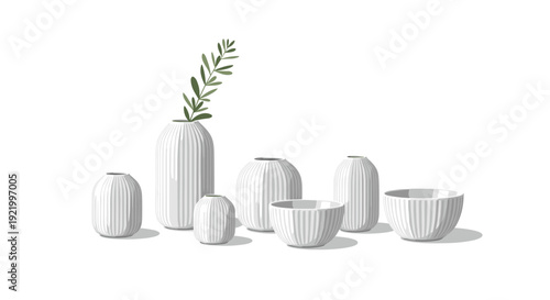 Seven white ceramic ribbed vases and bowls of varying sizes are neatly arranged with a single olive branch adorning one tall vase.