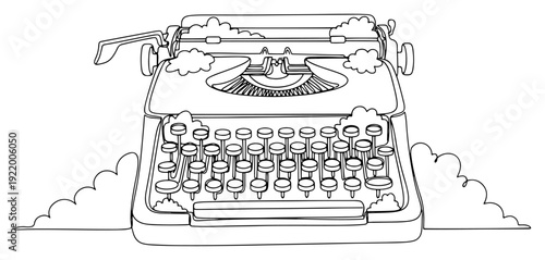 Vintage retro typewriter with keys and artistic foliage for storytelling and writing concept