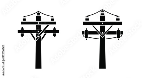 Two electrical transmission towers depicted in a stark black silhouette