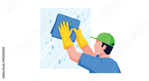 A person wearing yellow rubber gloves and a green baseball cap is actively cleaning a transparent window pane with a blue microfiber cloth.
