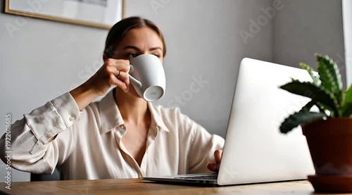 Employee Working From Home Typing on Keyboard with Coffee Mug