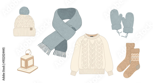 A diverse collection of winter clothing items including a knitted hat, scarf, mittens, a sweater, socks, and a small lantern, are shown on a white background.