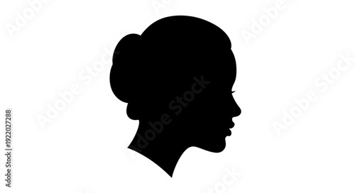 Elegant silhouette of a womans profile, showcasing refined features and classic hairstyle.