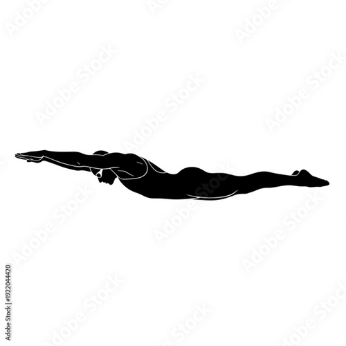 Diver in mid plunge with goggles and swim cap