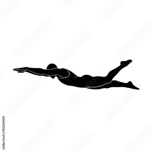 Diver in mid plunge with outstretched arms and legs