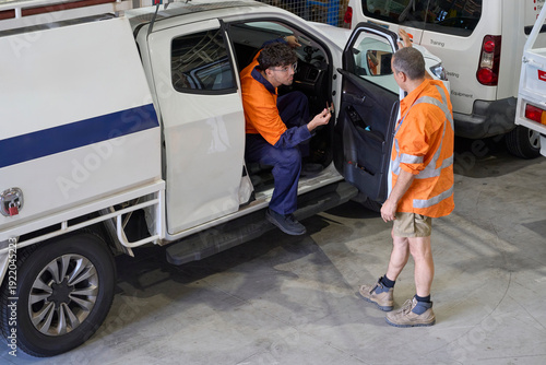 Apprentice being introduced to service  vehicle