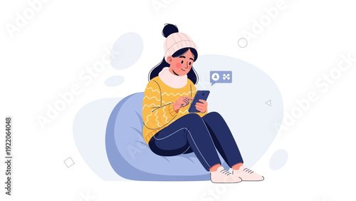 Woman Relaxing with Smartphone on Bean Bag Chair in Cozy Winter Outfit