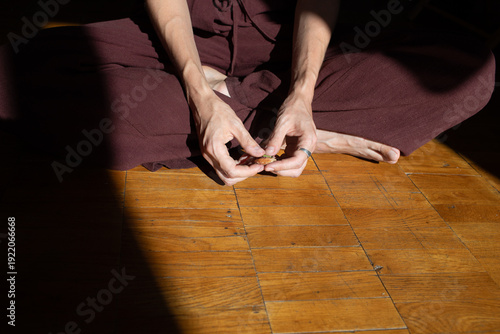 the woman is sitting in the room