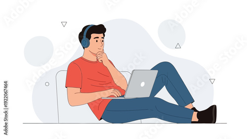 Young man with headphones on laptop, relaxing on sofa, online learning, remote work concept