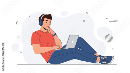 Young man with headphones using laptop, learning, working, and relaxing