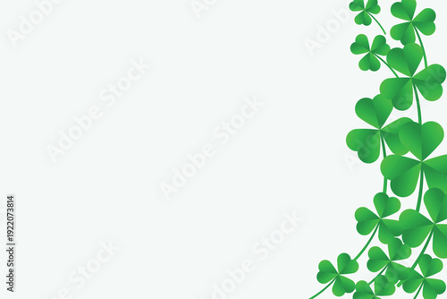 Green shamrock border with layered clover leaves on white background, ideal for St. Patricks Day and festive templates.
