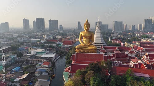 Big golden buddha statue riverside temple pagoda local village city background Bangkok Thailand