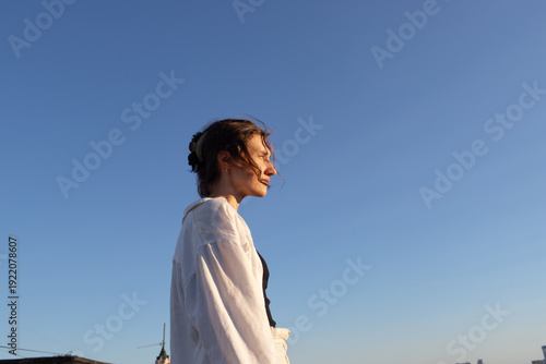 A woman walks on the roof