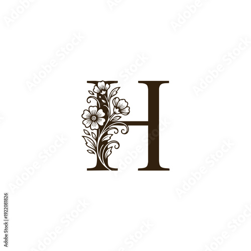 Elegant vintage floral letter H initial with delicate blooming flowers and botanical vines, decorative alphabet engraving isolated on white.