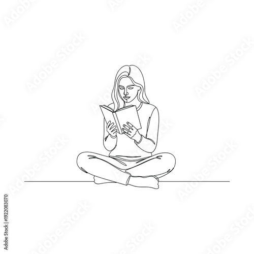 Serene woman reading a book in a peaceful setting