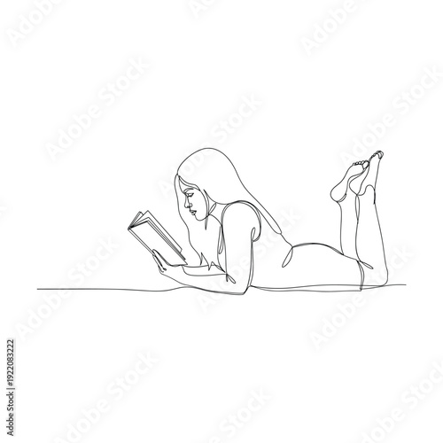 Woman relaxing while reading a book in a peaceful setting